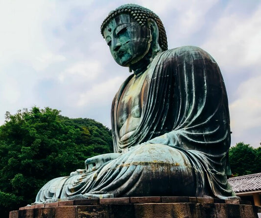 The Buddha Sits