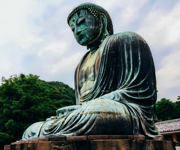 The Buddha Sits