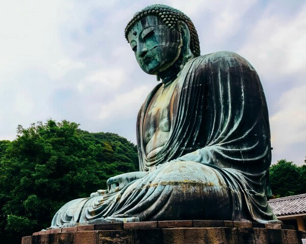 The Buddha Sits