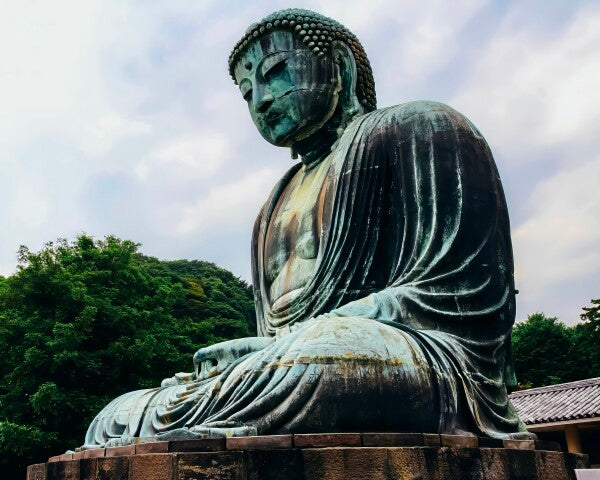 The Buddha Sits