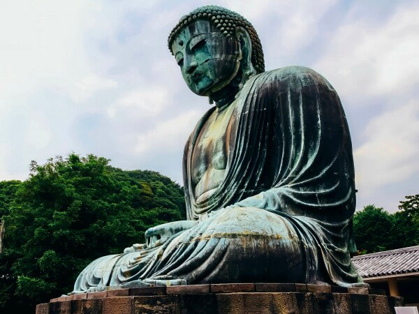 The Buddha Sits