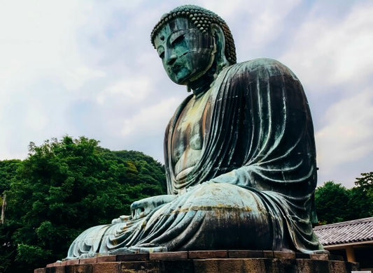 The Buddha Sits